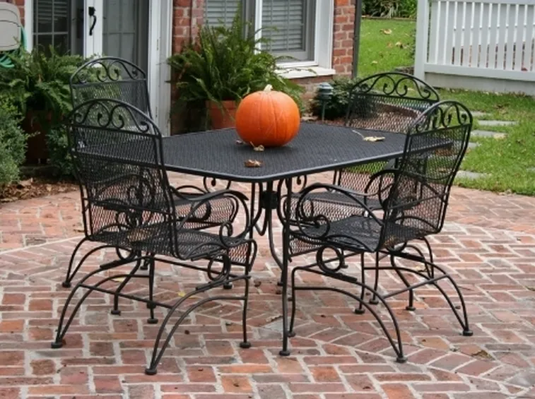 http://www.adeoma.org/wp-content/uploads/2010/10/Wrought-Iron-Outdoor-Patio-Tables.jpg